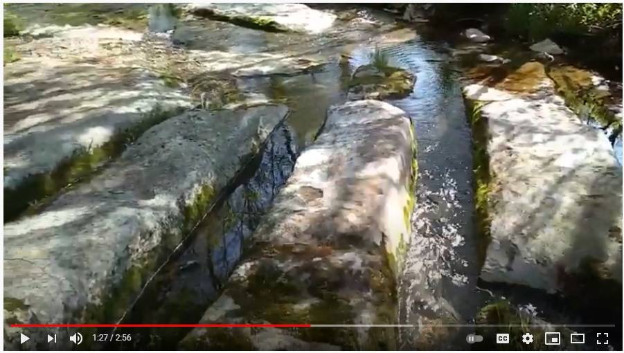 Diagonal bedrock cuts in creek.jpg